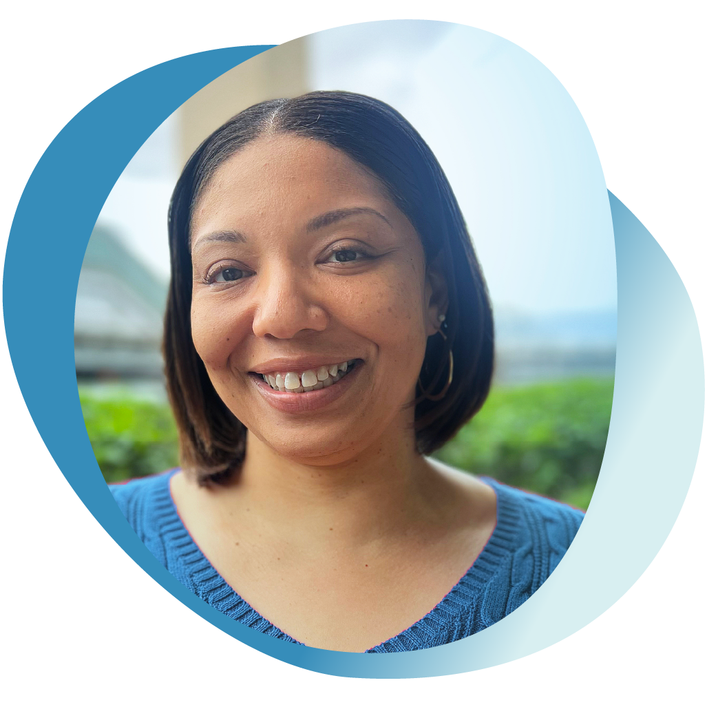 Toshia, a woman living with GPP, smiling and sharing her story of perseverance